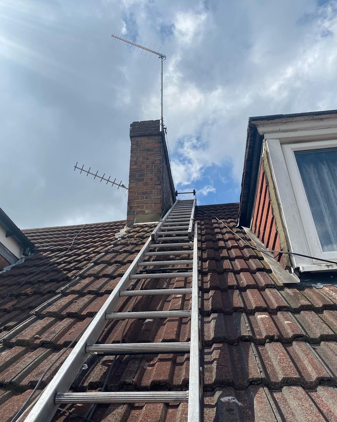 TV aerial installed on a chimney in Harpenden