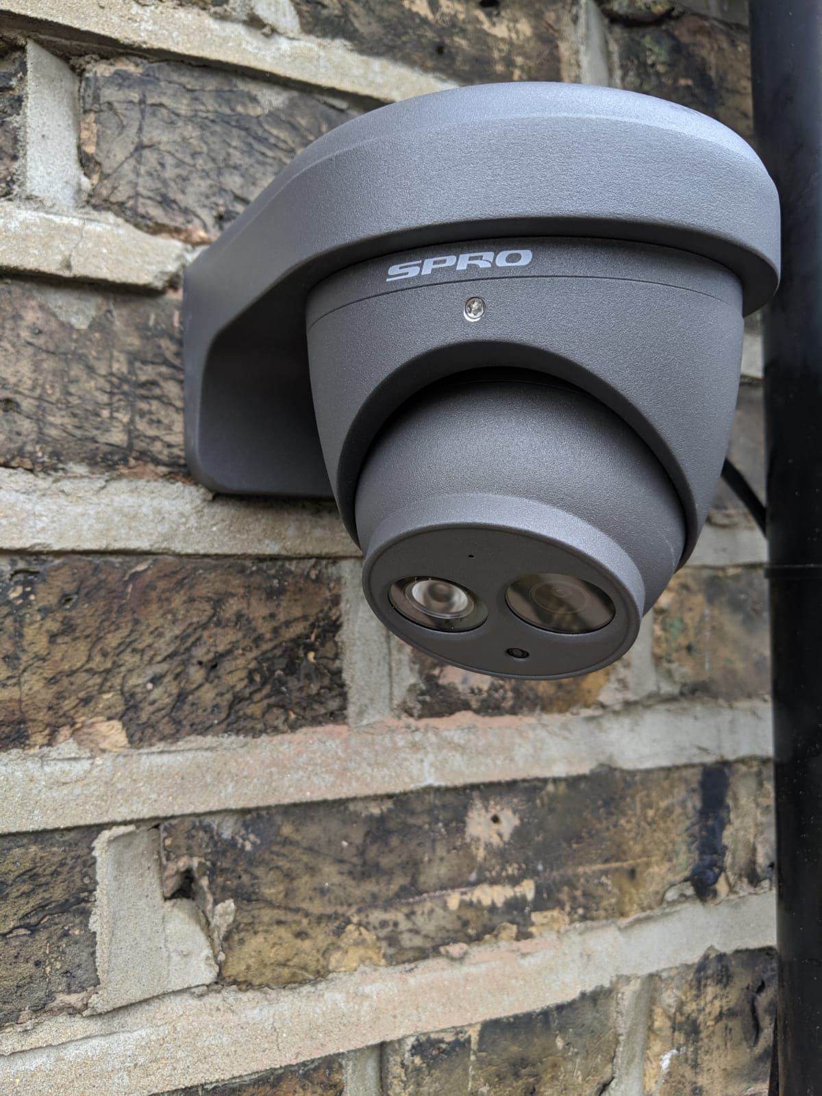 HD CCTV dome camera installed on an exterior wall