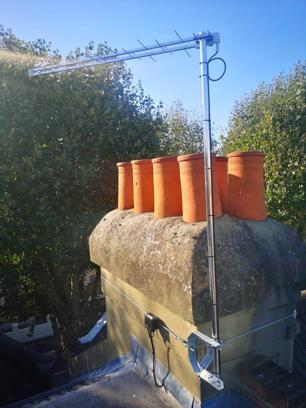 Digital TV aerial installed on a chimney stack